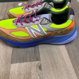 COPY - New Balance 990
Mens size 10 like new 
Blue - orange - brown green great…